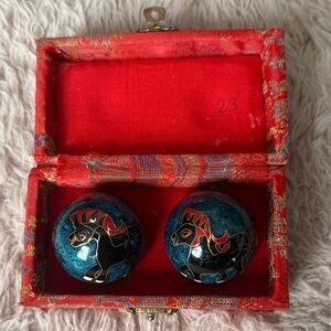 Vintage manual winding  Blue and Red Baoding Balls making sounds during rotation